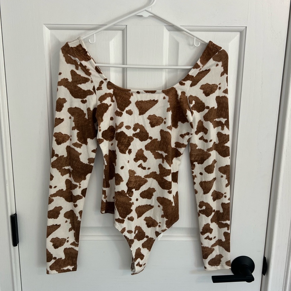 ALTAR’D STATE: cow print bodysuit